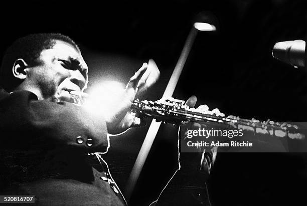 John Coltrane performs on stage at the Half Note club, New York, 1965.