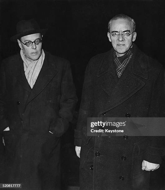 British diplomat Sir Stafford Cripps is met by Sir Oliver Harvey , British Ambassador to France, upon his arrival at the Quai d'Orsay in Paris for...