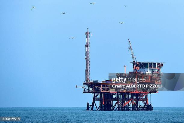 Italy's ENI gas platform Angelina in the Adriatic sea is seen off Lido di Dante near Ravenna on April 5, 2016. An offshore platform a stone's throw...