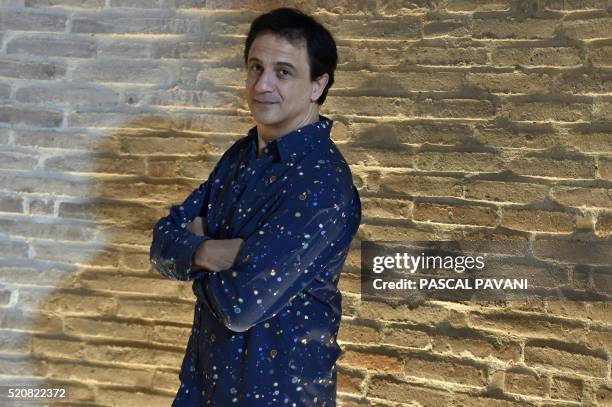 Kader Belarbi dance director and choreographer of the Toulouse capitol ballet poses for a photograph on April 12, 2016 in the Auditorium Saint-Pierre...