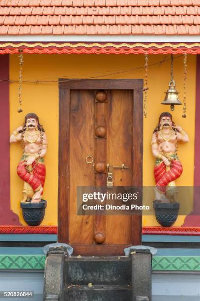 macebearers or doorkeepers at door of lord shiva temple, alleppey, alappuzha, kerala, india - indian temples stock pictures, royalty-free photos & images