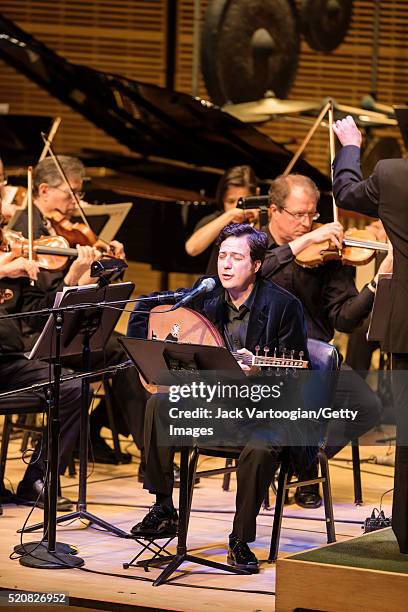 Turkish musician and composer Mehmet Ali Sanlikol plays oud as he performs the world premiere of his composititon 'Harabat' with the American...