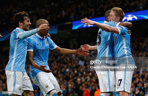 Kevin De Bruyne of Man City celebrates scoring the winning goal with his team mates David Silva, Fernando and Fernandinho during the UEFA Champions...