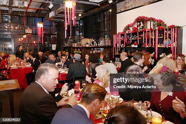 Guests eat during the 2016 Morbid Anatomy Museum Gala at Morbid Anatomy Museum on April 12, 2016 in the Brooklyn borough of New York City.