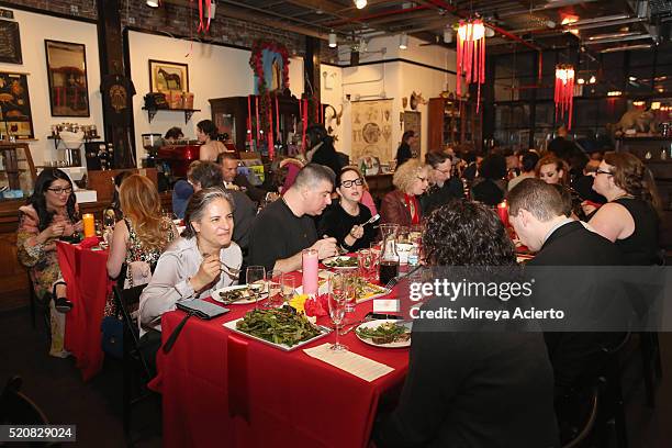 Guests eat during the 2016 Morbid Anatomy Museum Gala at Morbid Anatomy Museum on April 12, 2016 in the Brooklyn borough of New York City.