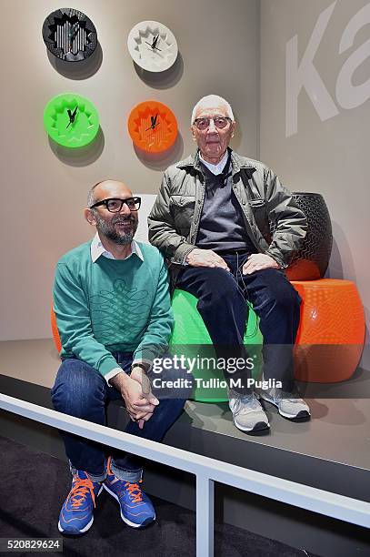 Designers Ferruccio Laviani and Alessandro Mendini pose at Kartell Talking Minds during Milan Design Week 2016 on April 13, 2016 in Milan, Italy.