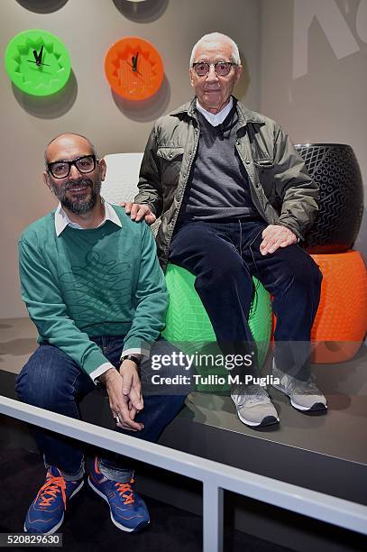 Designers Ferruccio Laviani and Alessandro Mendini pose at Kartell Talking Minds during Milan Design Week 2016 on April 13, 2016 in Milan, Italy.