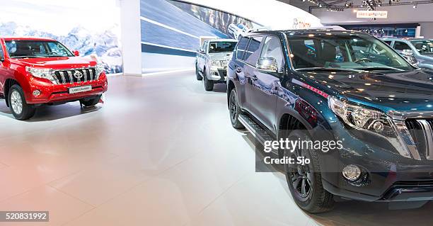 toyota land cruiser suv's and a hilux truck - toyota stock pictures, royalty-free photos & images