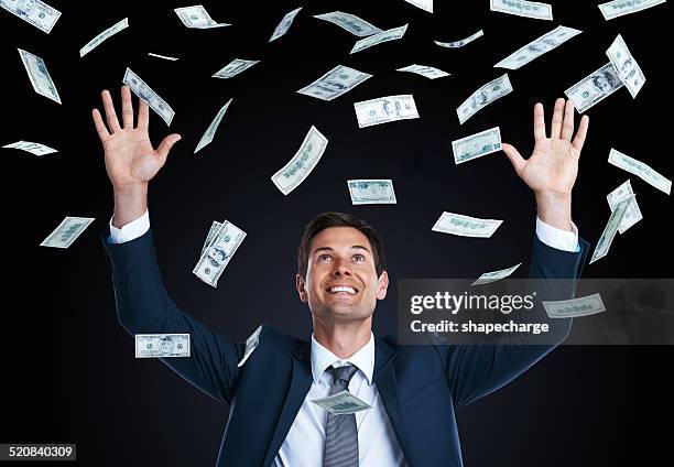 the cash keeps on coming! - winnings stock pictures, royalty-free photos & images