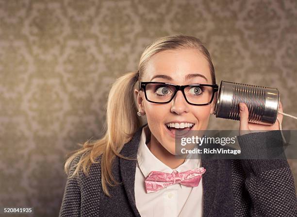 female nerd with mobile phone - plåtburkstelefon bildbanksfoton och bilder