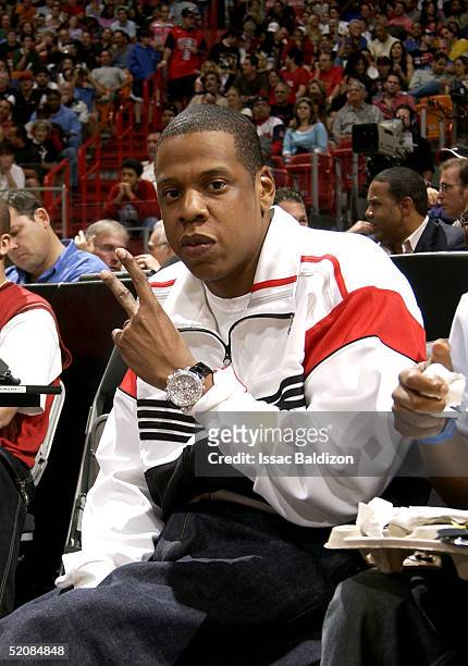 Rapper/Producer Jay-Z watches the game between the Miami Heat and the Houston Rockets on January 30, 2005 at American Airlines Arena in Miami,...