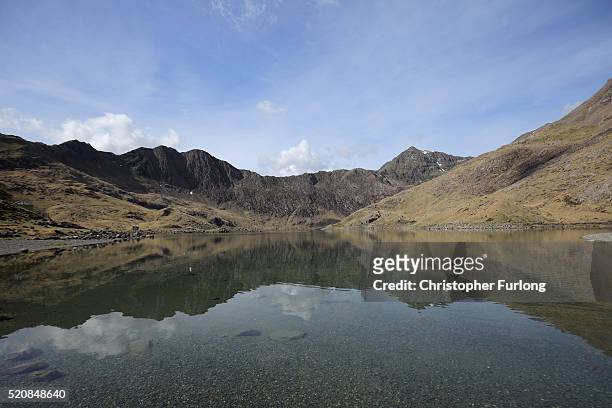General view Llyn Llydaw and Snowdon where British landscape artist Anthony Garratt will float his giant painting below the peak of Snowdon on April...