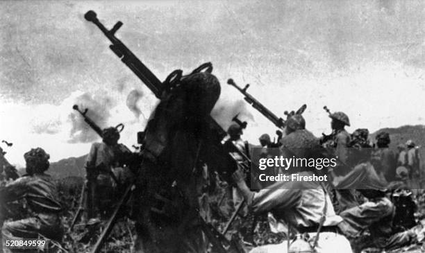 Battle of Dien Bien Phu-1954 Vietnamese antiaircraft 12,7mm of Battalion 387, Brigade 308, in the posture of prepared to fight.