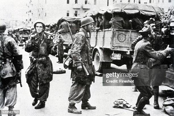 Second World War-Italian Armistice in 1943. German paratroopers control the Italian prisoners after the fighting in the city supported on 9 and 10...