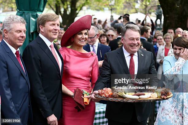Munich mayor Dieter Reiter, King Willem-Alexander of the Netherlands, Queen Maxima of the Netherlands and Bavarian Minister of Agriculture Helmut...