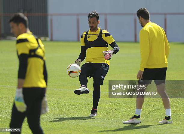 Sevilla's Portuguese goalkeeper Beto practices during a training session on the eve of the UEFA Europa League quarter finals second leg football...