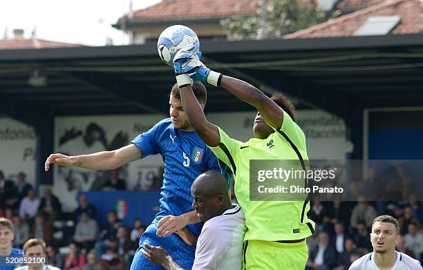 Marco Tumminello of Italy competes with Loic Badiashile goalkeeper of France during the U18 international friendly match between Italy and France at...