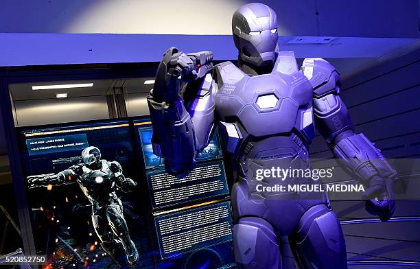 Photo taken on April 13, 2016 shows Marvel Comics superhero "War Machine" on display at the interactive Marvel Avengers STATION exhibition in the...