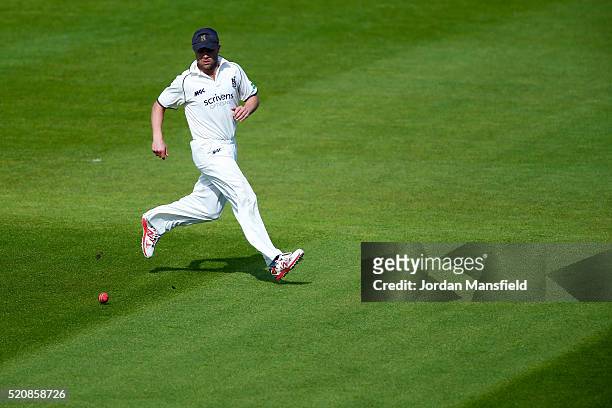 Jonathan Trott of Warwickshire fields a ball during day four of the Specsavers County Championship Division One match between Hampshire and...