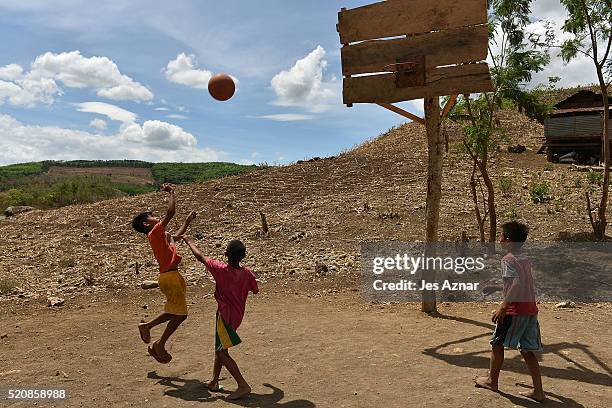 Children play basketball amidst a dried up corn field in Kabacan on April 10, 2016 in Cotabato, Mindanao, Philippines. The heatwave brought on by the...