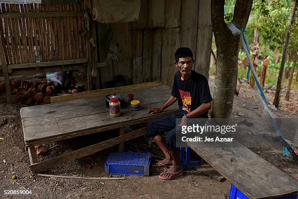 Bobong Gambay a farmer in Kabuling on April 10, 2016 in Cotabato, Mindanao, Philippines. Mr Gambay shares how his family of 5 and 36 other families...