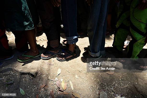 Farmers queue for a meal provided by civic organizations in Kidapawan city on April 7, 2016 in Cotabato, Mindanao, Philippines. Thousands of farmers...