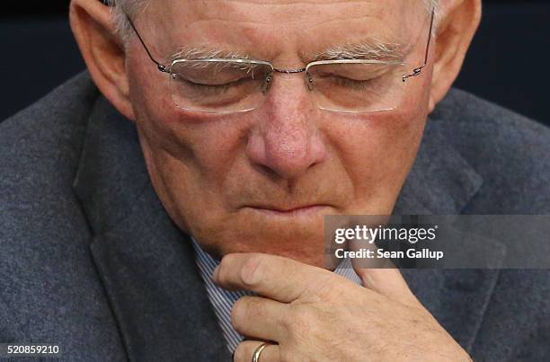 German Finance Minister Wolfgang Schaeuble attends debates at the Bundestag during an extraordinary discussion over foreign tax havens following...