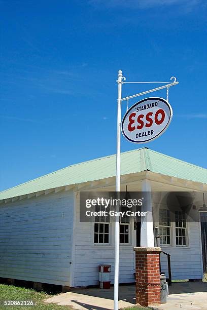 old time americana esso service station - esso stock pictures, royalty-free photos & images