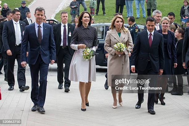 Danish Crown Prince Frederik and Crown Crown Princess Mary of Denmark greet Mexican President Enrique Pena Nieto and his wife Angelica Rivera during...