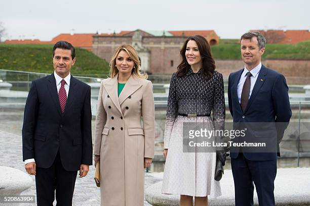 Danish Crown Prince Frederik and Crown Crown Princess Mary of Denmark greet Mexican President Enrique Pena Nieto and his wife Angelica Rivera during...