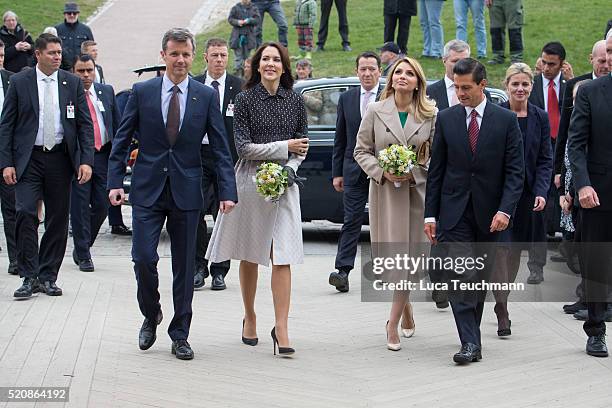 Danish Crown Prince Frederik and Crown Crown Princess Mary of Denmark greet Mexican President Enrique Pena Nieto and his wife Angelica Rivera during...