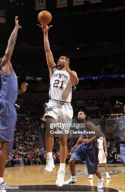 Tim Duncan of the San Antonio Spurs shoots a layup against the Washington Wizards during the game at SBC Center on January 17, 2005 in San Antonio,...