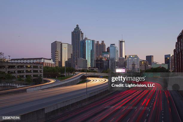 atlanta, georgia skyline at night - atlanta skyline car stock pictures, royalty-free photos & images