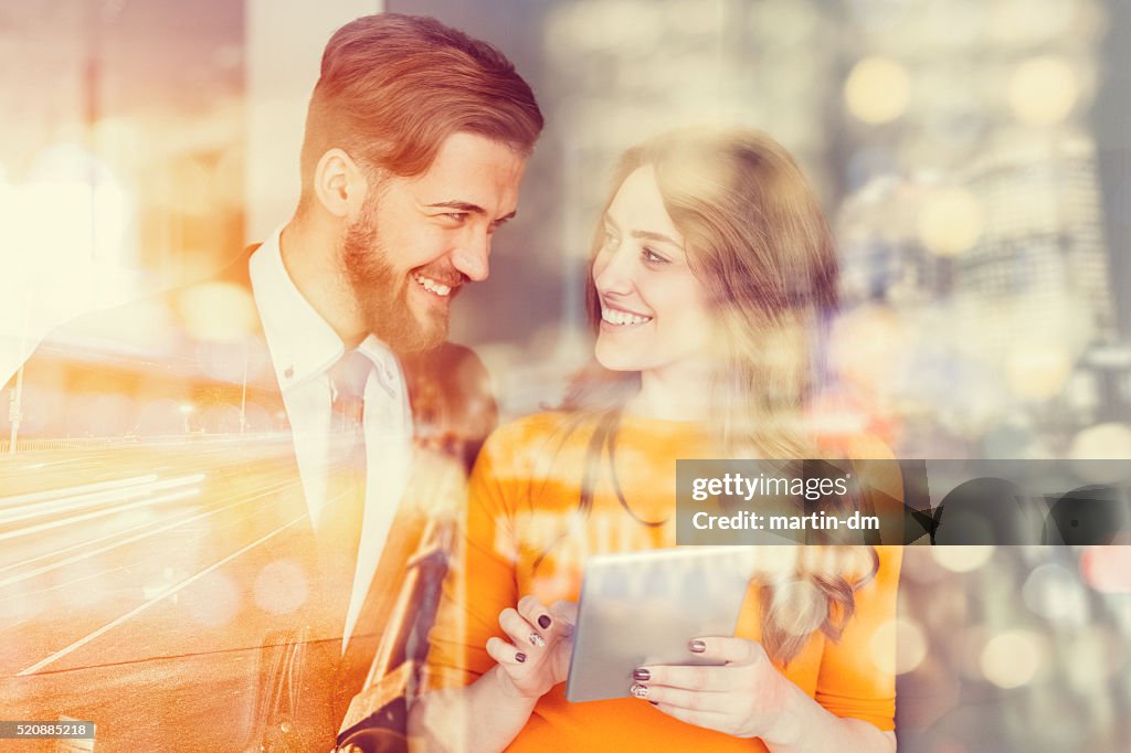 Business people using tablet in the office