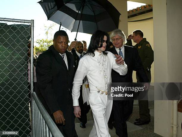 Singer Michael Jackson and his lawyer Thomas Mesereau arrive for a court appearance at Santa Maria Superior Court January 31, 2005 in Santa Maria,...