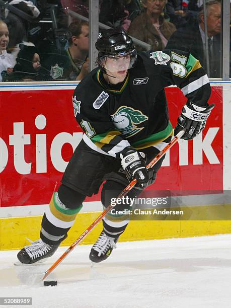 David Bolland of the London Knights looks to make a play against the Erie Otters during the Ontario Hockey League game at John Labatt Centre on...