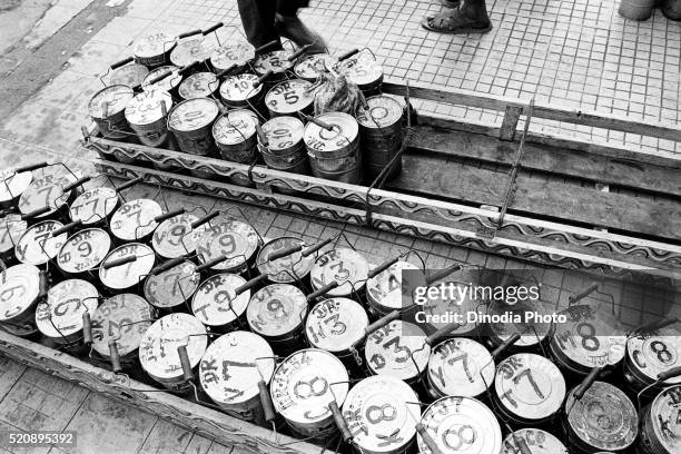 dabbawalas tiffin boxes at churchgate, mumbai, maharashtra, india, asia 1989 - tiffin box fotografías e imágenes de stock