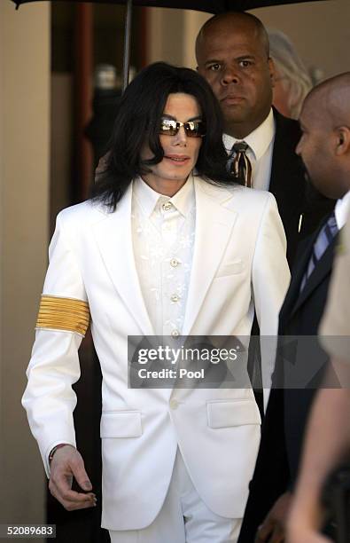 Singer Michael Jackson leaves for a lunch break during a court appearance at the Santa Maria Superior Court January 31, 2005 in Santa Maria,...