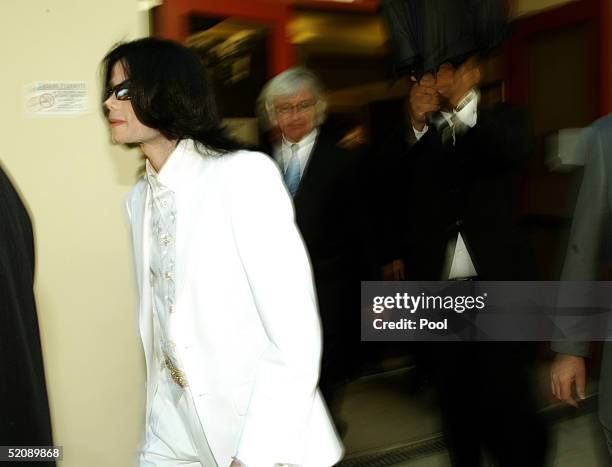 Singer Michael Jackson leaves for a lunch break during a court appearance at Santa Maria Superior Court January 31, 2005 in Santa Maria, California.