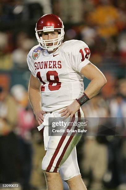 Quarterback Jason White of the Oklahoma Sooners looks on against the USC Trojans in the 2005 FedEx Orange Bowl National Championship on January 4,...