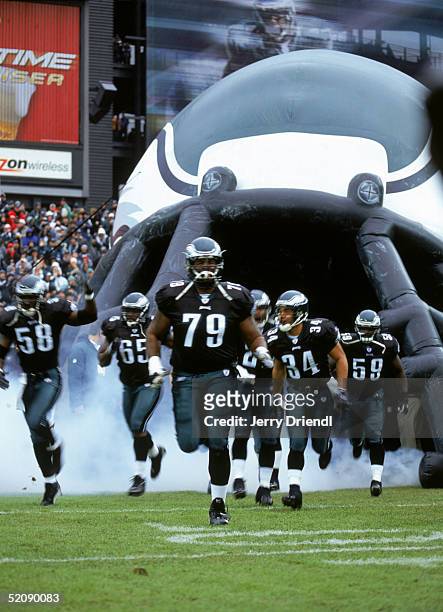 The Philadelphia Eagles enter the field prior to their game against the Cincinnati Bengals at Lincoln Financial Field on January 2, 2005 in...