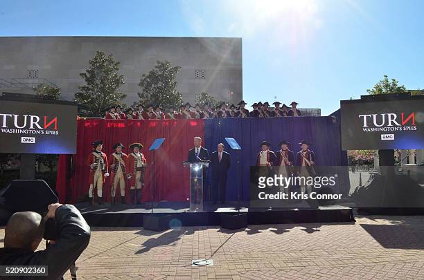 Former governors Mike Huckabee and Martin O'Malley speak during the "TURN: Washington Spies- DC Key Art Unveiling" at Kogan Plaza on The George...