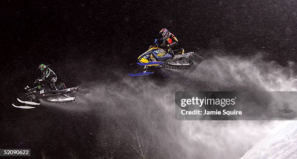 Tucker Hibbert and Paul Bauerly compete in a SnoCross qualifying heat during day 3 of the Winter X Games on January 31, 2005 at Buttermilk Mountain...