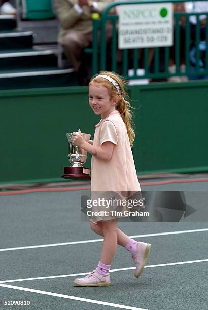 Anna Mcenroe Daughter Of Tennis Star John Mcenroe With His Trophy At A Charity Tennis Tournament On The Tennis Courts At Buckingham Palace In Aid Of...
