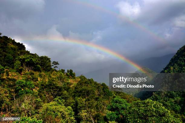 rainbow on cloudy sky, sikkim, india, asia - rainbow forrest abstract bildbanksfoton och bilder