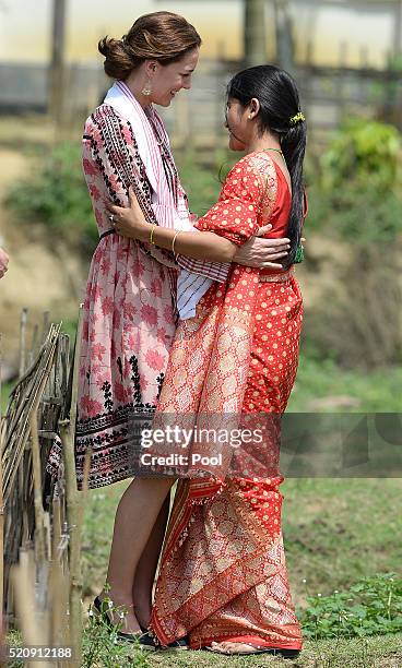 Catherine, Duchess of Cambridge visits Pan Bari Village in the Kaziranga National Park, meet villagers, look at a traditional weaving loom and and...