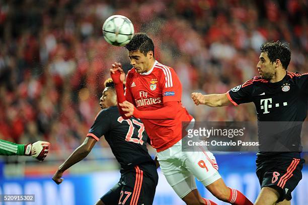 Raul Jiménez of SL Benfica scores the first goal against FC Bayern Muenchen during the UEFA Champions league Quarter Final Second Leg match between...