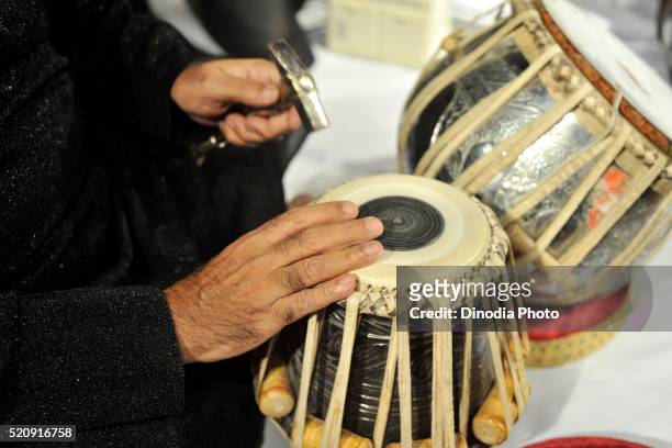 tuning tabla classical indian musical instrument, mumbai, maharashtra, india, asia - tabla stock pictures, royalty-free photos & images