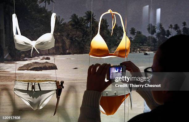 Bikini worn by Ursula Andress during the shooting of the movie "Dr No" and a bikini worn by Halle Berry during the shooting of the movie "Die Another...