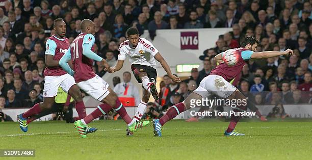Marcus Rashford of Manchester United scores their first goal during the Emirates FA Cup Sixth Round replay match between West Ham United and...